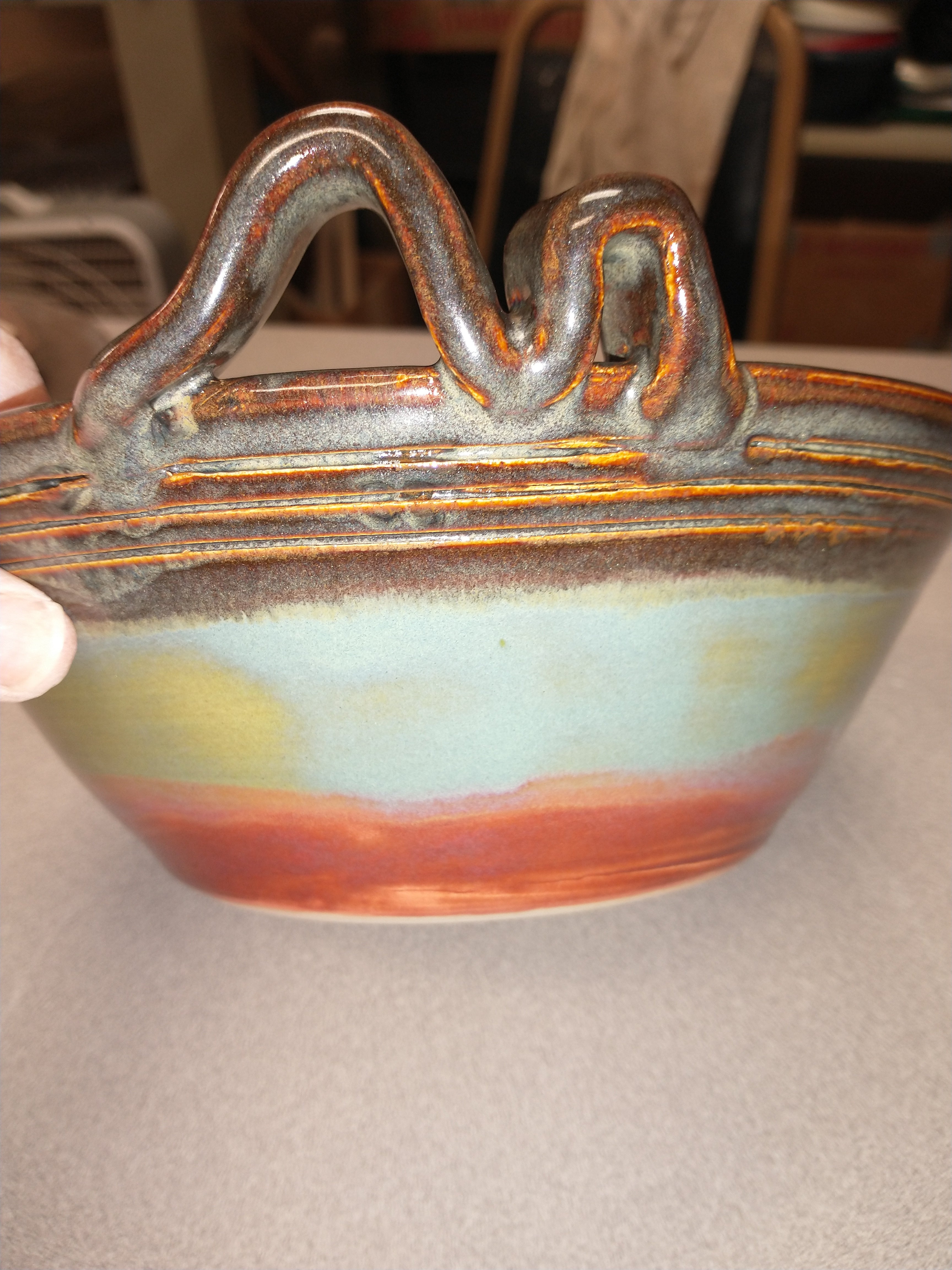 Handles on pottery wheel pieces